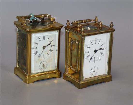 Two cased French brass carriage timepieces with alarm